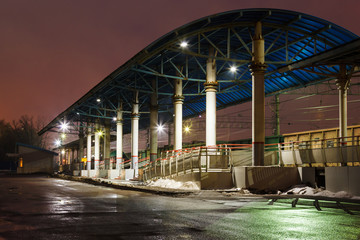 platform on the railway station at night