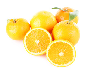 Ripe tangerines and oranges with leaves isolated on white