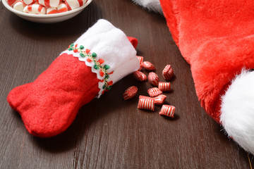 Obraz na płótnie Canvas Christmas stocking with candy
