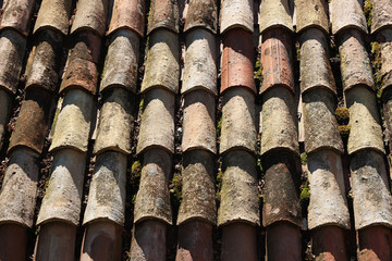 Eroded tiles of an old roof