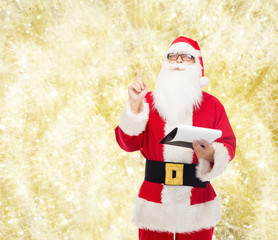 man in costume of santa claus with notepad