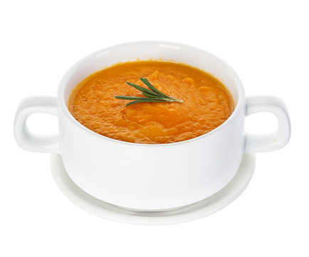 Pumpkin soup isolated on white background