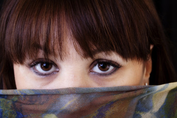 Fototapeta premium Older Caucasian Woman Holding Cloth Over Face