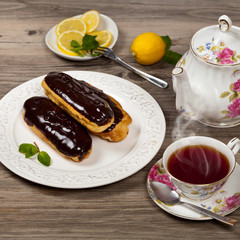 Eclairs with a chocolate ganache. Selective focus.