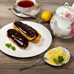 Eclairs with a chocolate ganache. Selective focus.