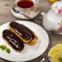 Eclairs with a chocolate ganache. Selective focus.