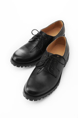 Black leather shoe isolated