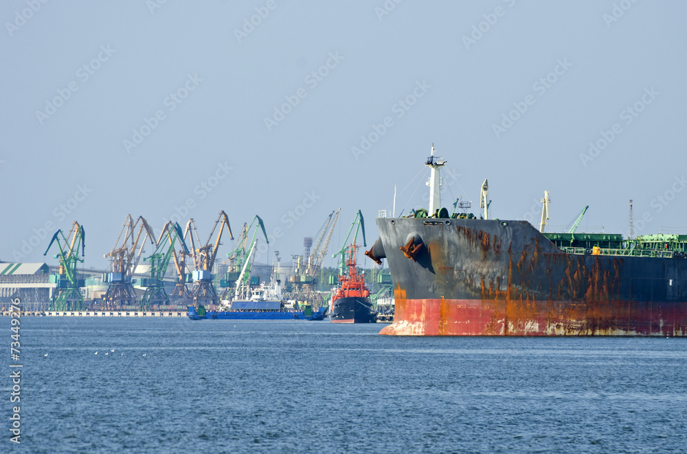 Wall mural old industrial ship in port