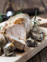 Delicious roast pork fillet with mushroom sauce