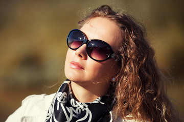 Beautiful fashion woman in sunglasses outdoor