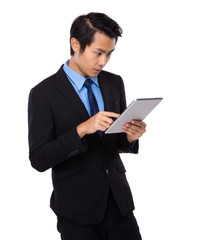 Businessman look at digital tablet