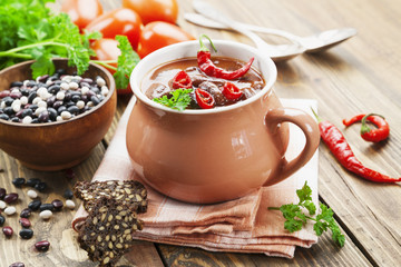 Chili soup with red beans and greens