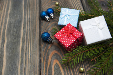 Fototapeta na wymiar christmas trees with heap of gift boxes