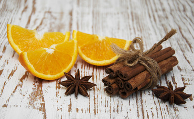 Orange with cinnamon sticks