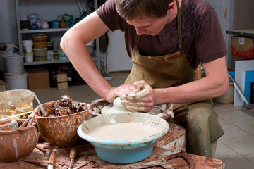 potter, creating an earthen jar