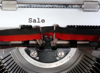 sale written with ink with the typewriter