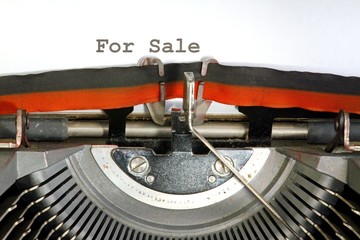 sale written with black ink with the old typewriter