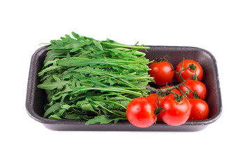 Fresh arugula and tomatoes.