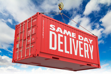 Naklejka premium Same Day Delivery - Red Hanging Cargo Container.
