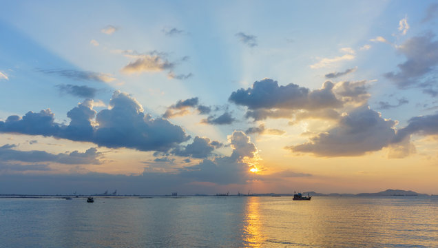 fishing boat and sunset, with  koh sichang and sriracha harbour