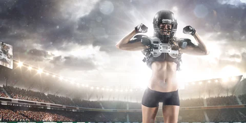 Fotobehang American football female player is posing © 103tnn