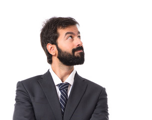 Businessman thinking over isolated white background