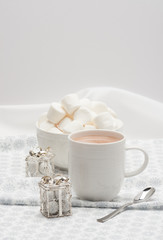 Fototapeta na wymiar Mug Of Hot Chocolate. Marshmallows And Sweets. Christmas Decorat