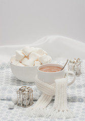 Fototapeta na wymiar Mug Of Hot Chocolate With Scarf. Marshmallows And Sweets. Christ