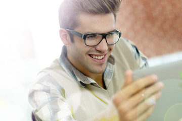 Young man with eyeglasses in training class