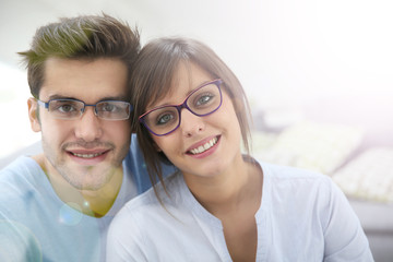 Portrait of young couple with eyeglasses on