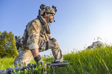 American Soldier on blue sky background