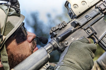 American Soldier aiming his rifle