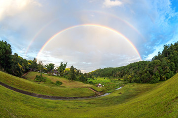 Rainbow over the hill