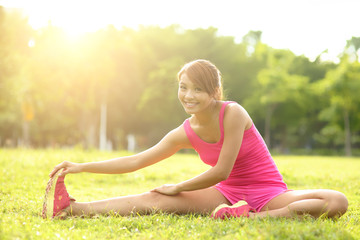 Woman performs stretching
