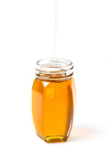 Little bottle filled with honey