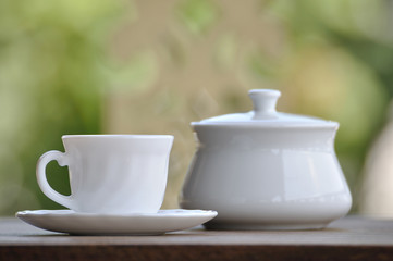 Obraz na płótnie Canvas Coffee cup set with beautiful bokeh background.