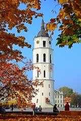 Walking in Cathedral square at autumn in Vilnius