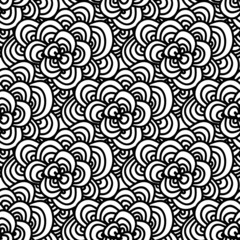 Seamless doodle. Simple floral pattern in black and white tones.