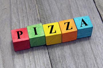 concept of pizza word on wooden colorful cubes