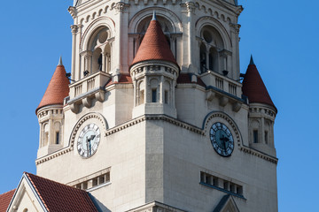 Church tower with a clock in city of Lodz, Poland
