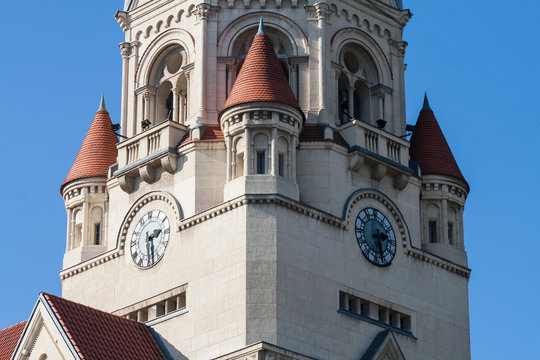 Fototapeta Church tower with a clock in city of Lodz, Poland