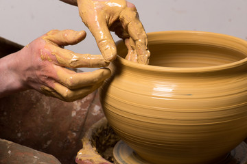 potter, creating an earthen jar