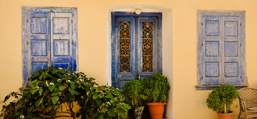 Ornamental blue doors and windows, Samos, Greece