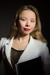Beautiful business woman with documents