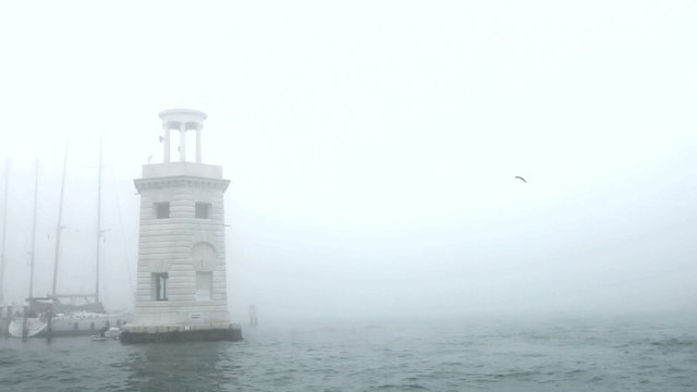 Beautiful lighthouse in fog