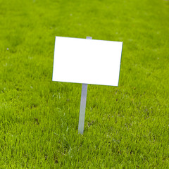 Sign on grass