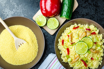 Couscous with grilled chicken meat and vegetables