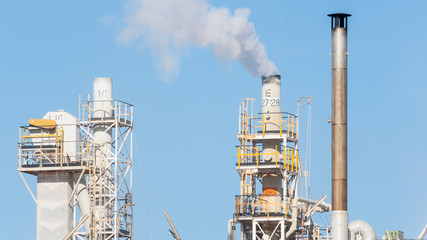 White smoke in the blue sky