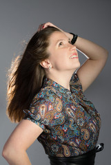 Beautiful  brunette woman looking up