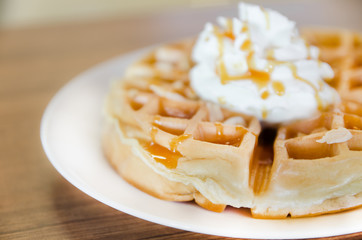waffles under the caramel topping